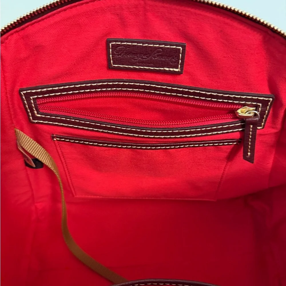 Dooney & Bourke reposhing this